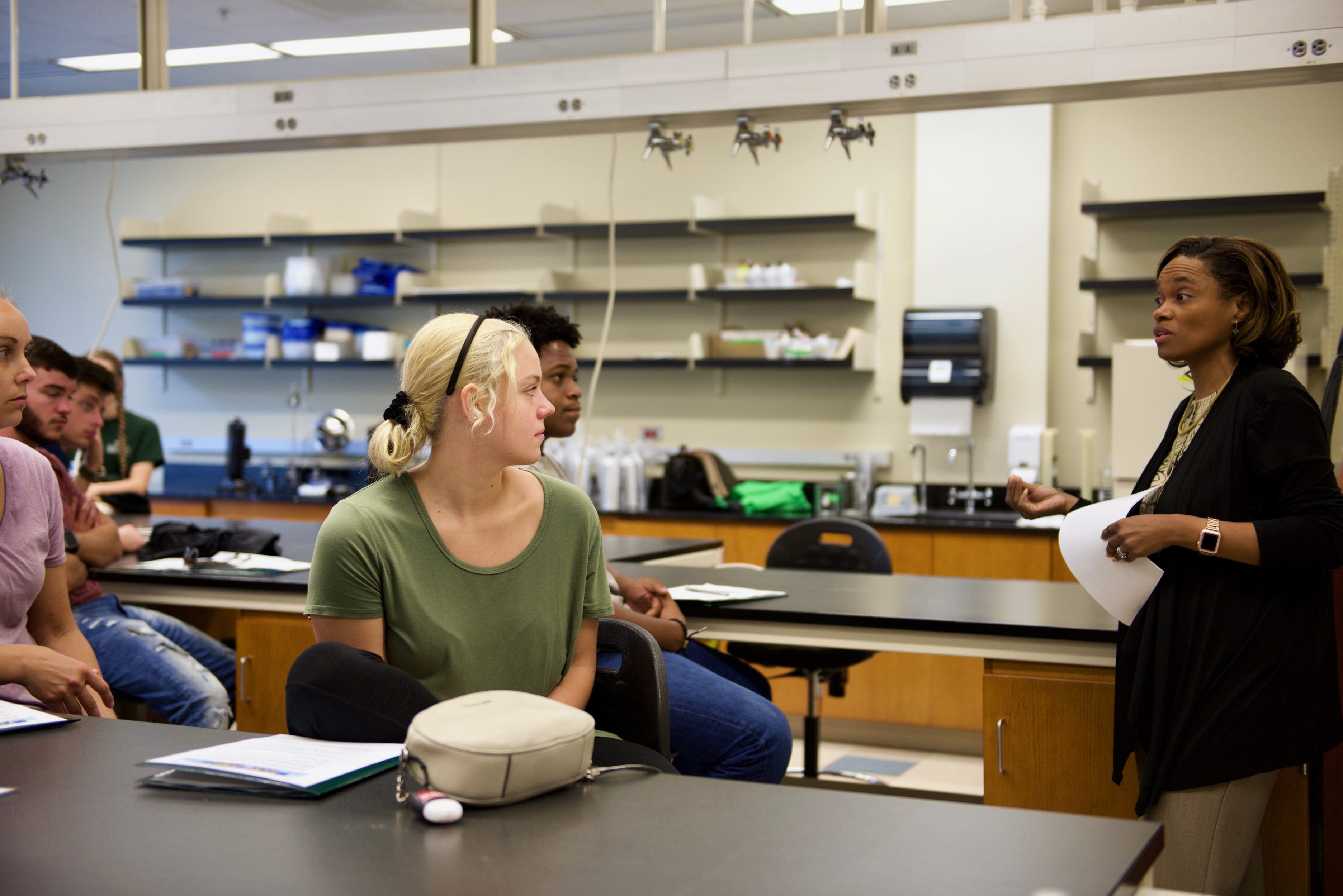 students listening to professor