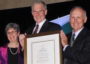Schneider receiving award
